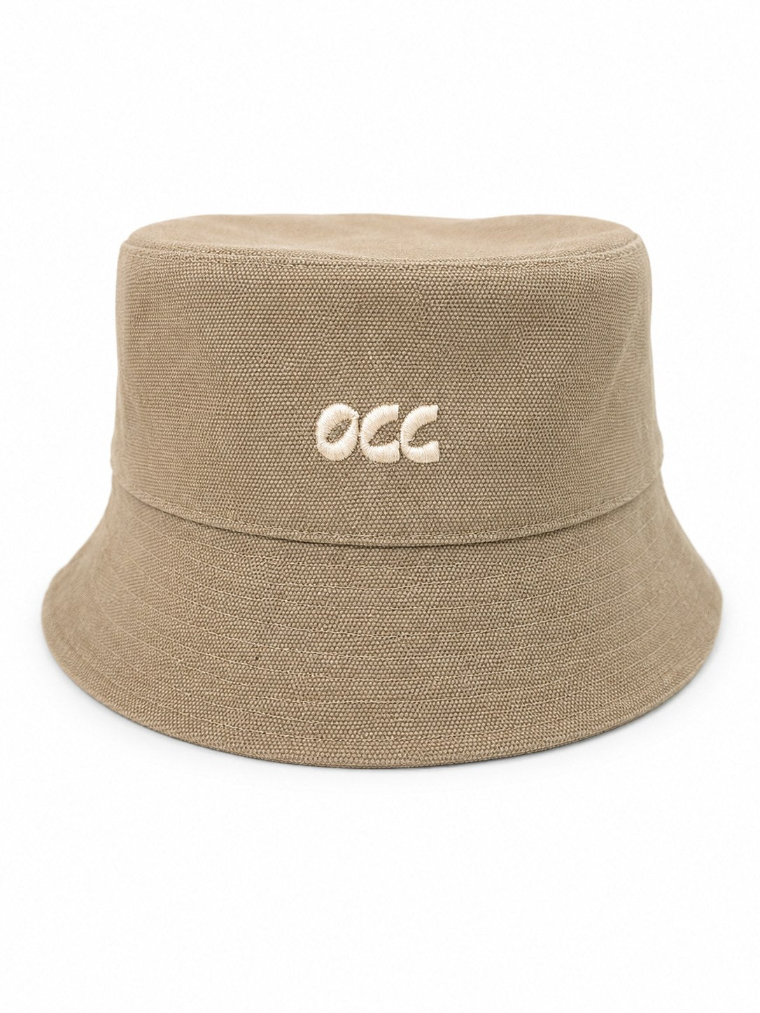 A beige bucket hat made of textured canvas fabric, featuring the letters 'occ' embroidered in white on the front, set against a plain white background.